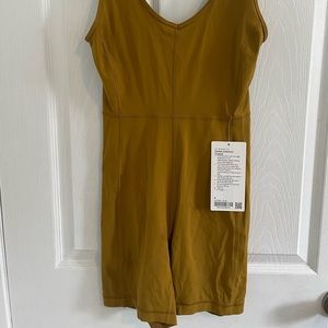 Lululemon romper, size 6, NWT’s, colour gold